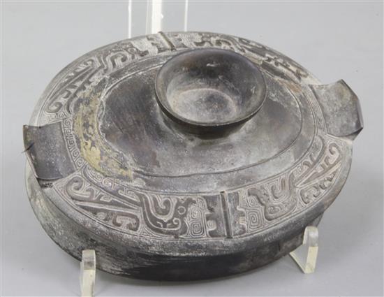 A Chinese archaic bronze ritual wine vessel and cover, You, late Shang/early Western Zhou dynasty, 11th century B.C., 22cm high, repair